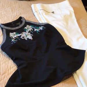 Black peplum sleeveless top so S.